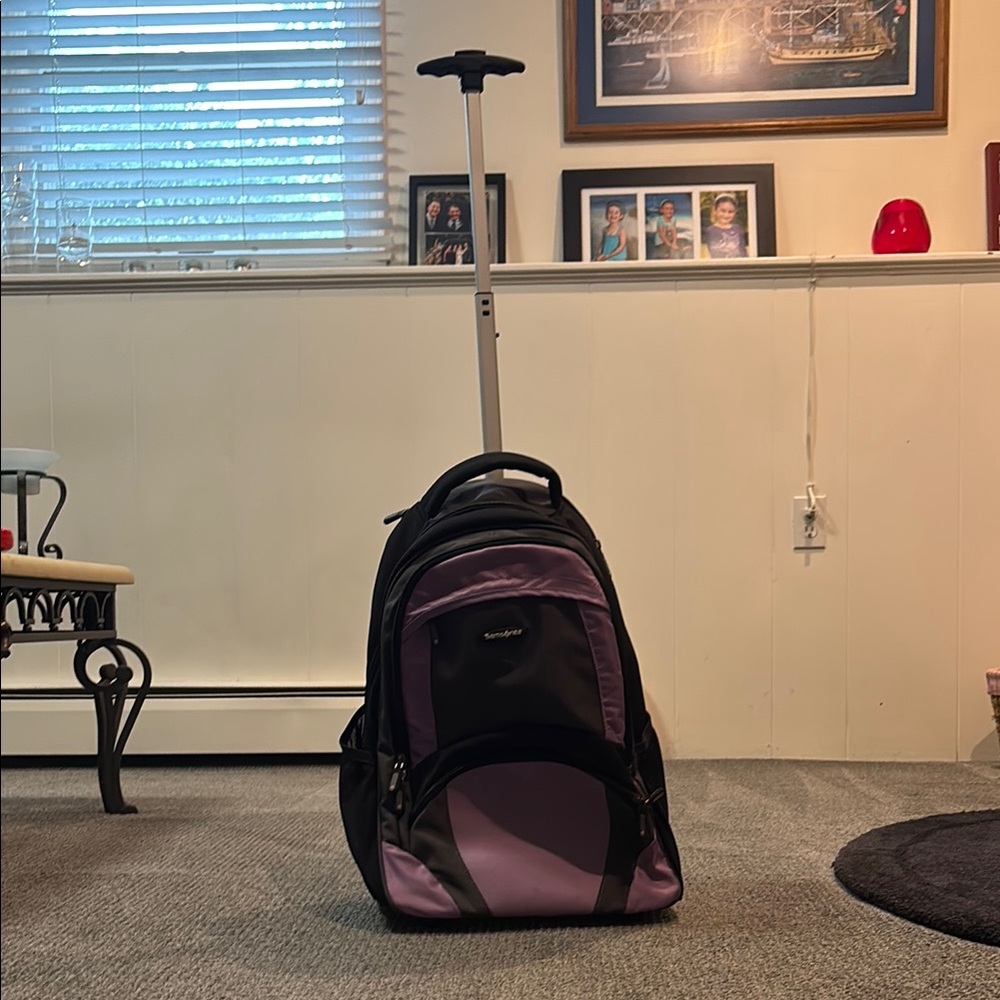 Samsonite Black and Purple Rolling Backpack